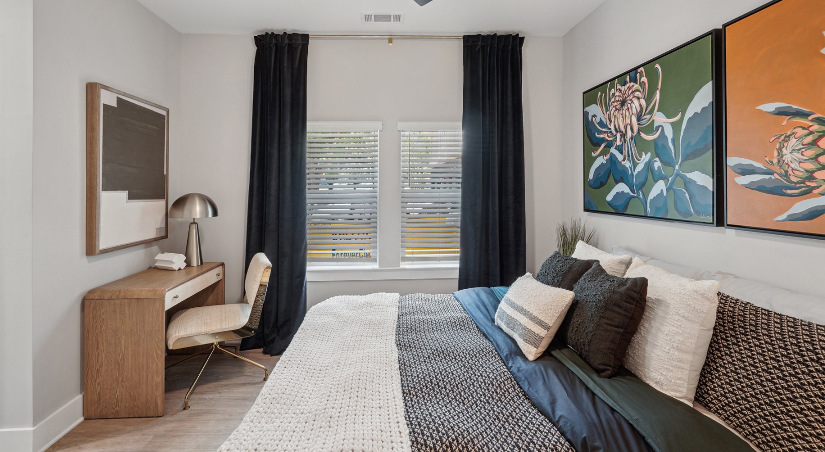 Closet space with shelves and ample lighting